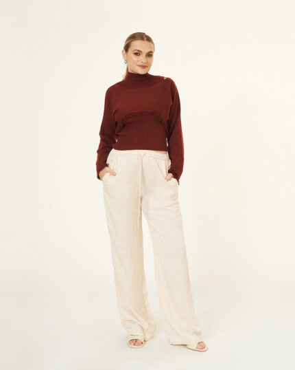 Sweater Cuello Alto con Flecos